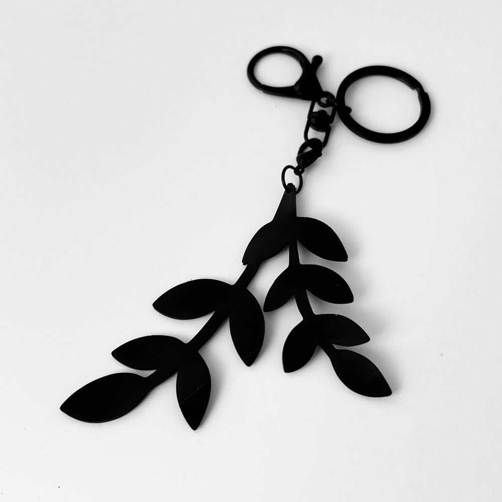 Cascading Vine Bag Charm keychains handcrafted from upcycled bicycle tubes.