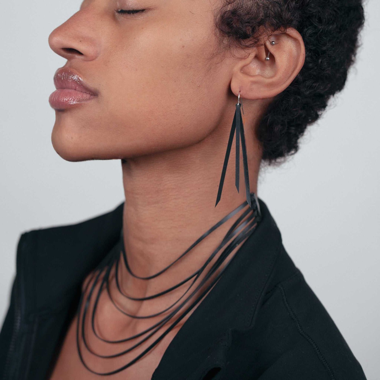 Shockwave Necklace and Kuiper Comet Earrings handcrafted in Black Verdasil® | Verdari Performance Jewelry |  KADEN & KAI®