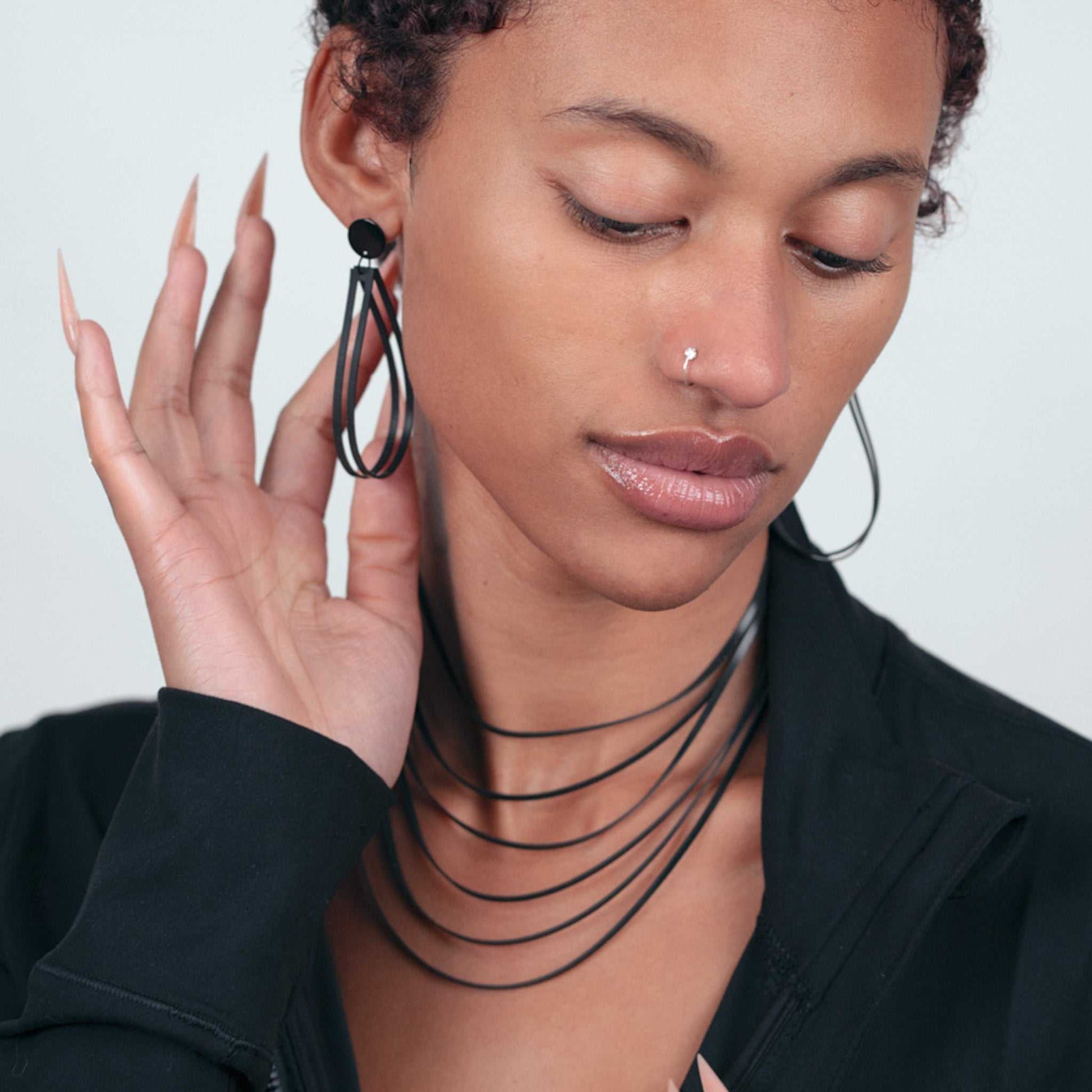 Shockwave Necklace and Super Sonic Earrings handcrafted in Black Verdasil™, Verdalux™ collection — Designs That Elevate. Performance jewelry by KADEN & KAI®.