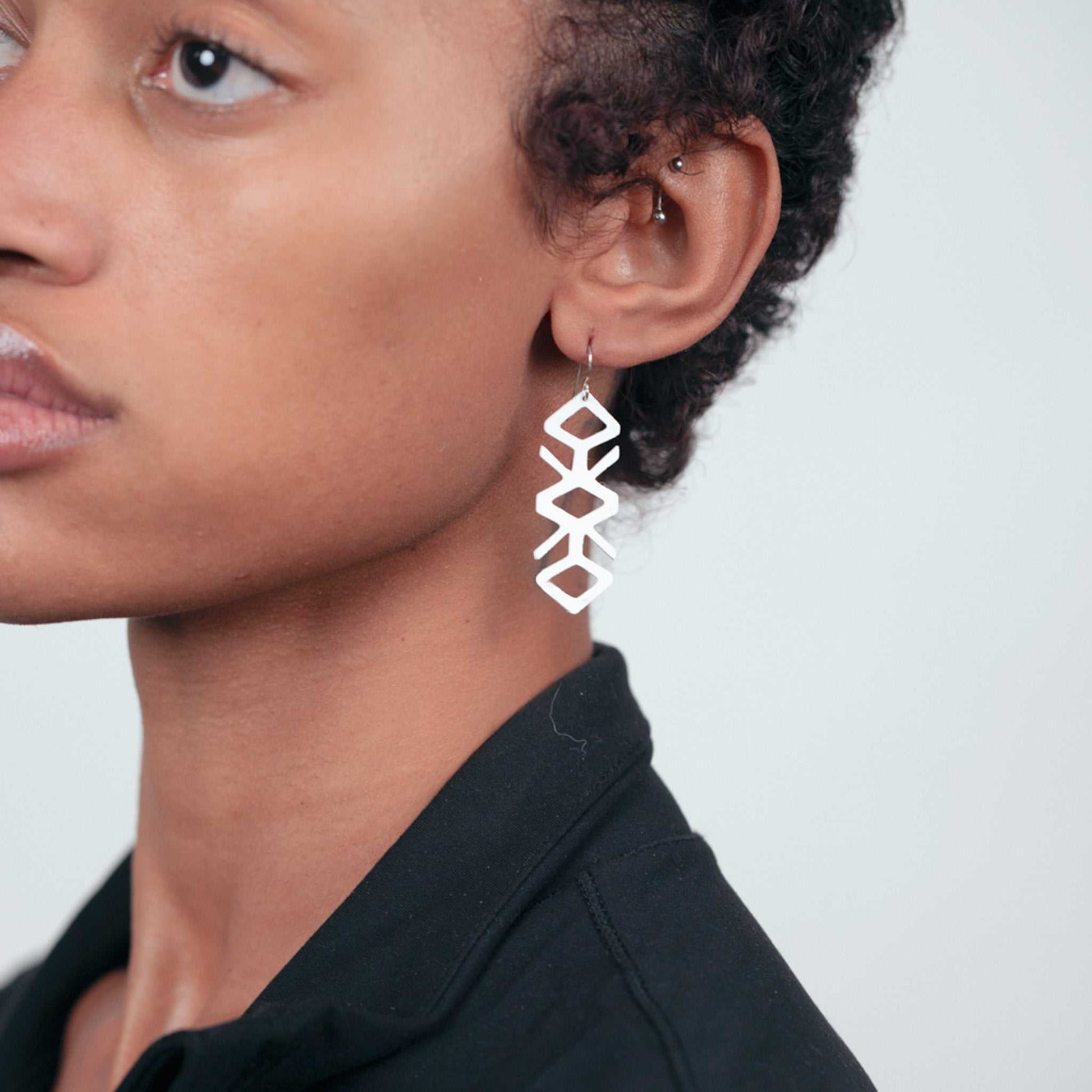 Tropical Vine Earrings handcrafted in White Verdasil™, Verdari™ collection — Designed For Motion. Performance jewelry by KADEN & KAI®.