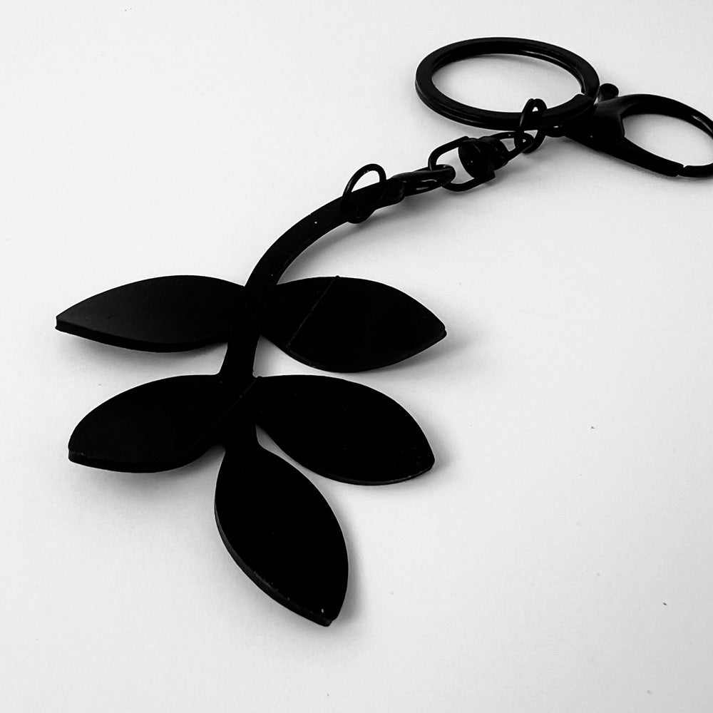 Twirly Twig Bag Charm keychains handcrafted from upcycled bicycle tubes.