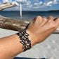 Daisy Bicycle Tube Bracelet on Wrist at Beach | Sustainable Fashion | Kaden & Kai