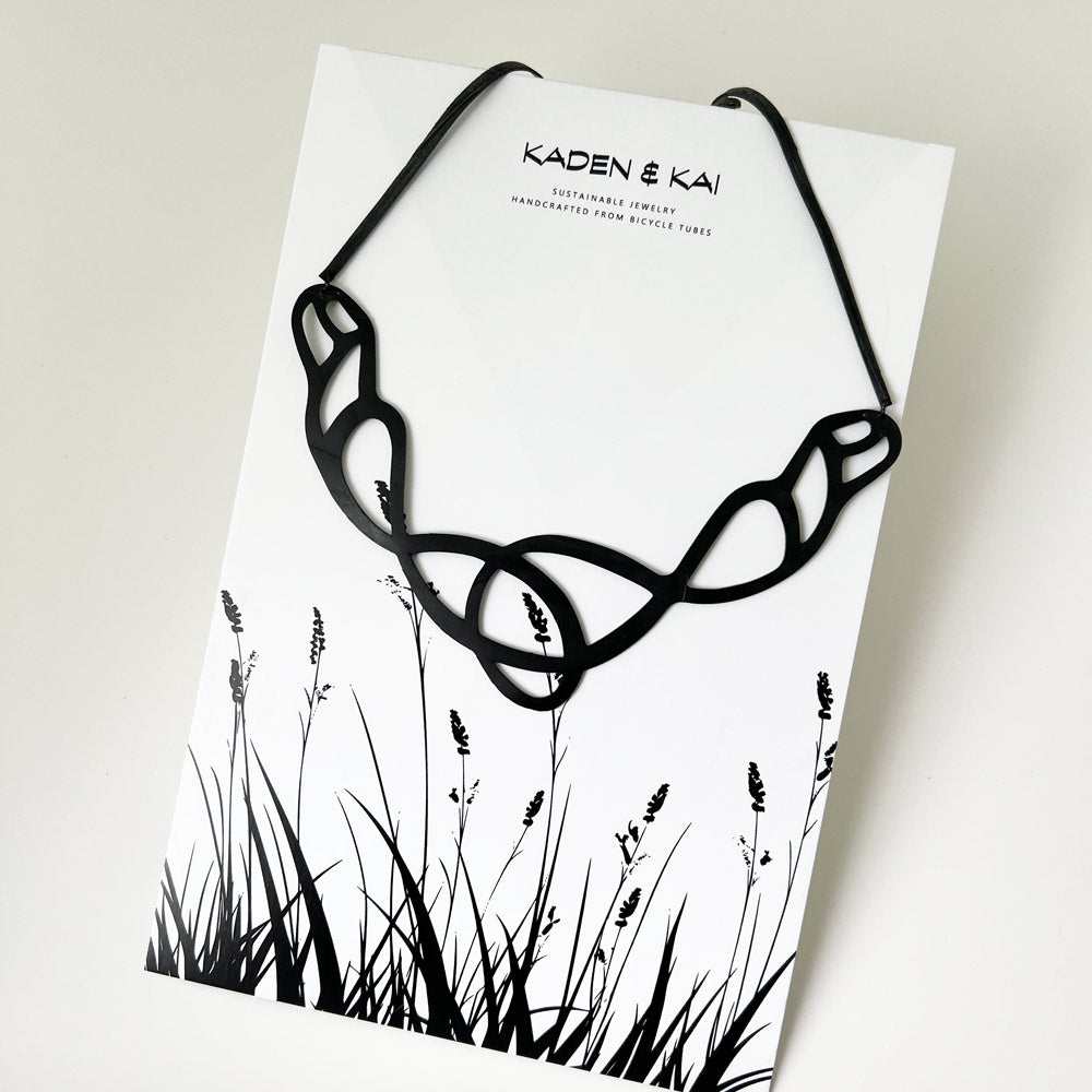 Pure Whimsy Bicycle Tube Necklace on Display Card | Sustainable Fashion | Kaden & Kai