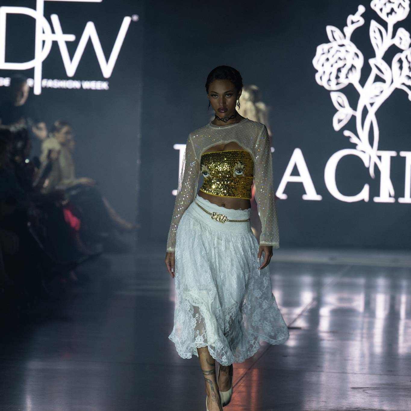 Fire+Whimsy Bicycle Tube Earrings Worn by Model on Fashion Show Runway | Sustainable Fashion Earrings | Kaden & Kai