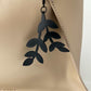 Close-up of Cascading Vine Bicycle Tube Key Chain on Handbag | Sustainable Fashion Accessory | Kaden & Kai