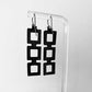 Back of Chain Reaction Bicycle Tube Earrings on Stand | Sustainable Fashion Earrings | Kaden & Kai