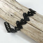 Isla Bicycle Tube Bracelet on driftwood | Handcrafted Floral Bracelet | Vine Bracelet | Kaden & Kai