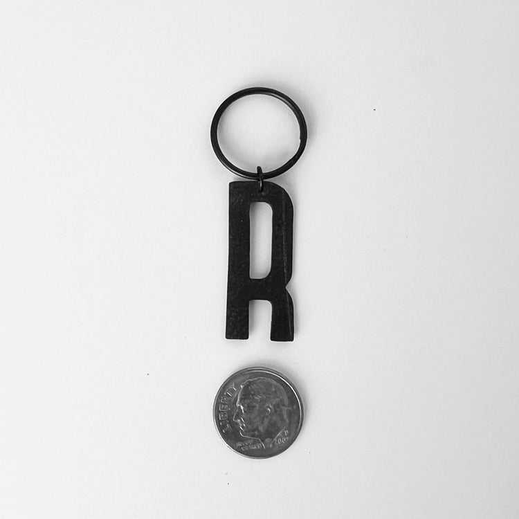 Monogrammed Key Chain Made from Upcycled Bicycle Tubes Next to Dime for Size | Kaden & Kai