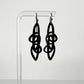 Pure Whimsy Bicycle Tube Earrings on Display Stand | Sustainable Jewelry | Kaden & Kai