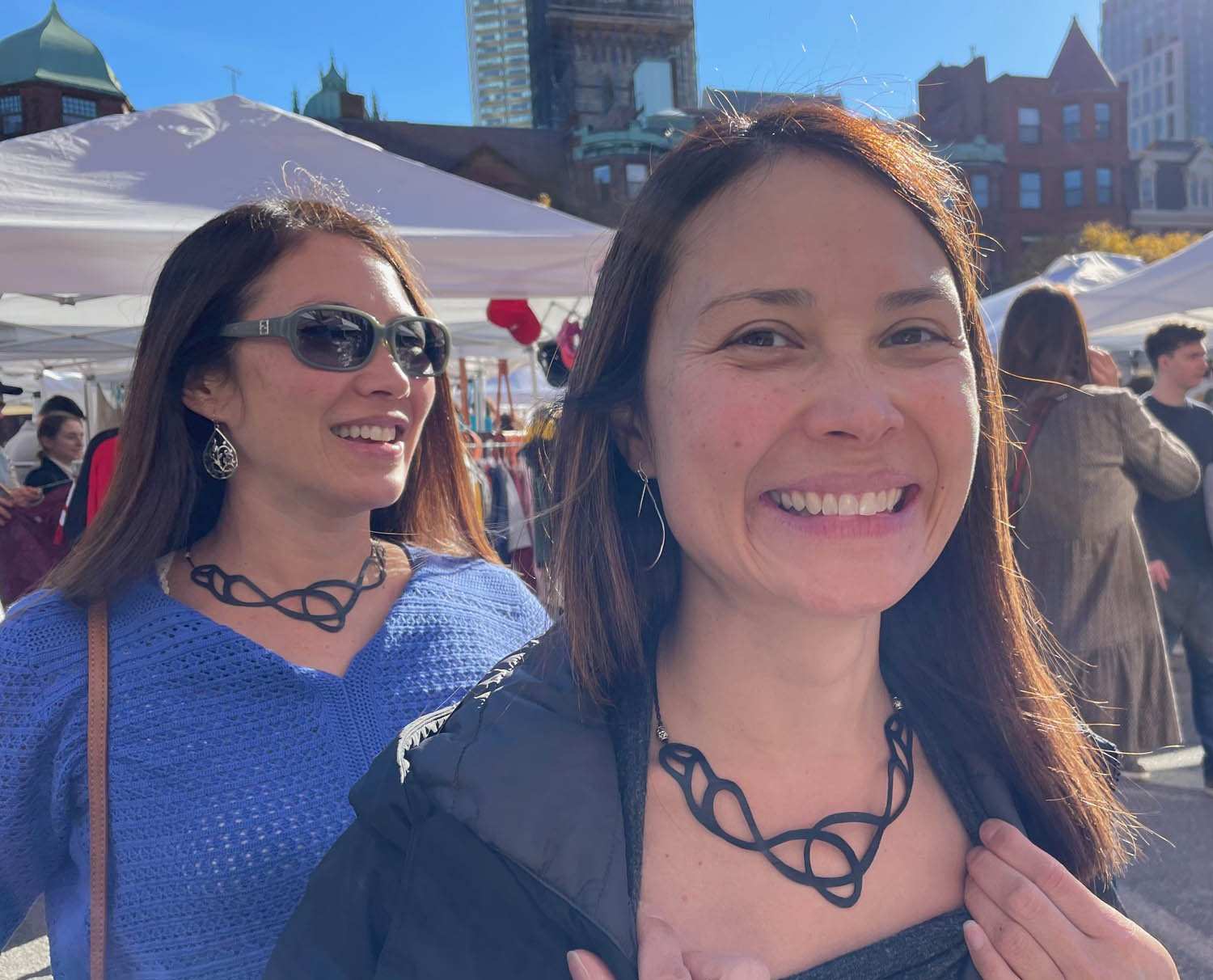 Pure Whimsy Bicycle Tube Necklace on two customers | Sustainable Jewelry | Kaden & Kai